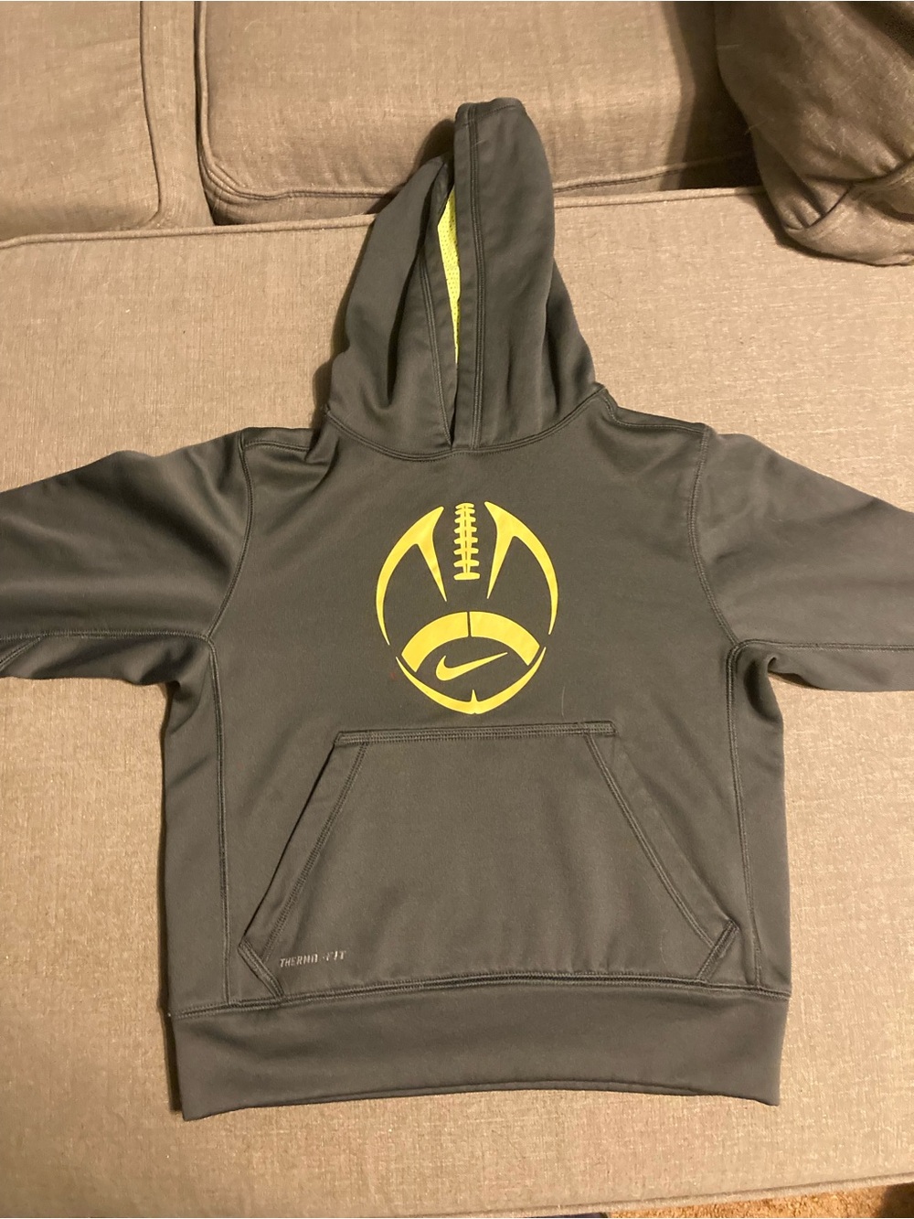 Nike Kids Dark Gray Hoodie with Yellow Football Logo